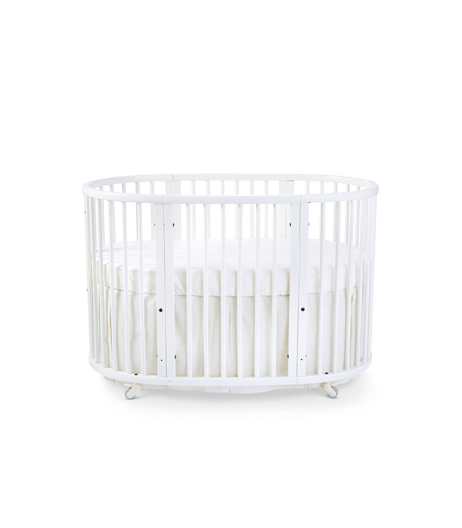 Stokke® Sleepi™ Bed, White. Bed Skirt Natural. US only.